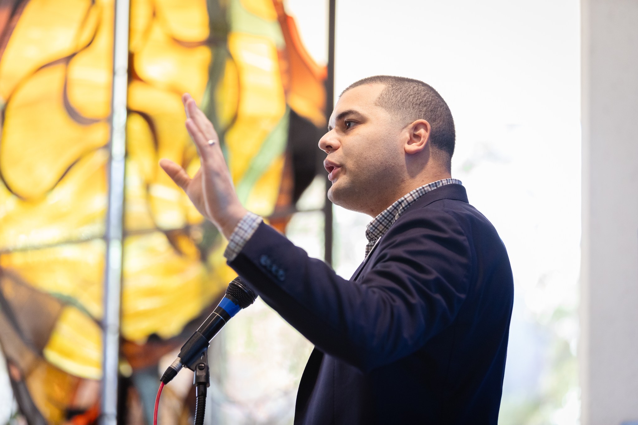 A speaker addressing guests at an Austin History Center Association event